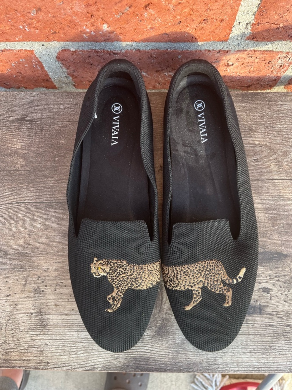 VIVAIA Women's Black Slip-On Loafers with Gold Leopard Motif